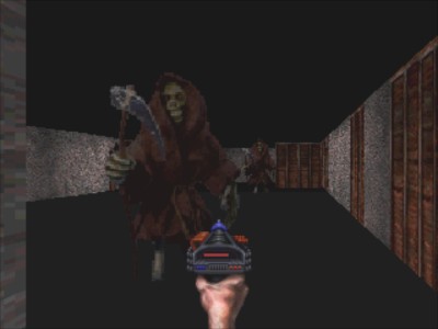 In-game screenshot: facing a ghoul in the corridor